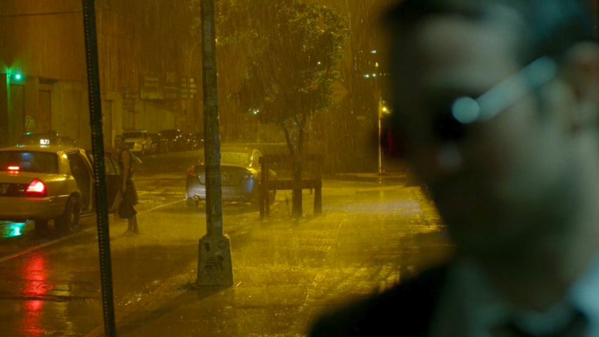 Matt "watches" Karen leaving in cab outside his apartment in the rain.