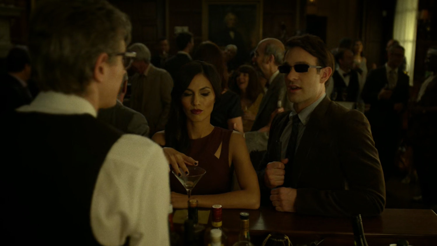 Matt and Elektra at a crowded faculty party.