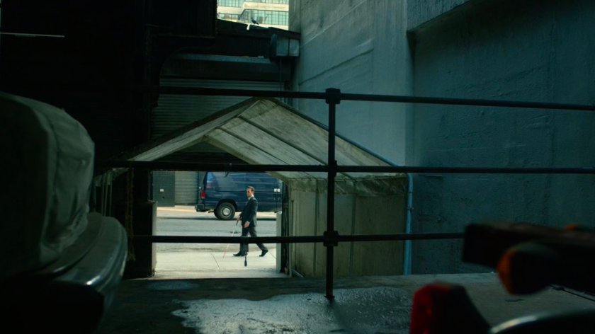 Matt walking into alley next to Yakatomi Building.