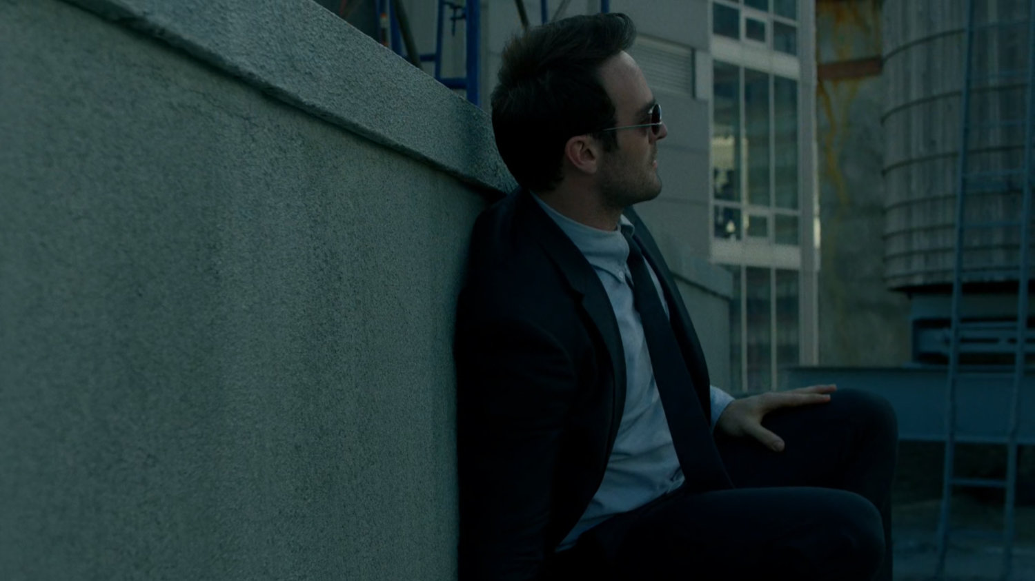 Matt crouched on a roof next to Yakatomi Building.