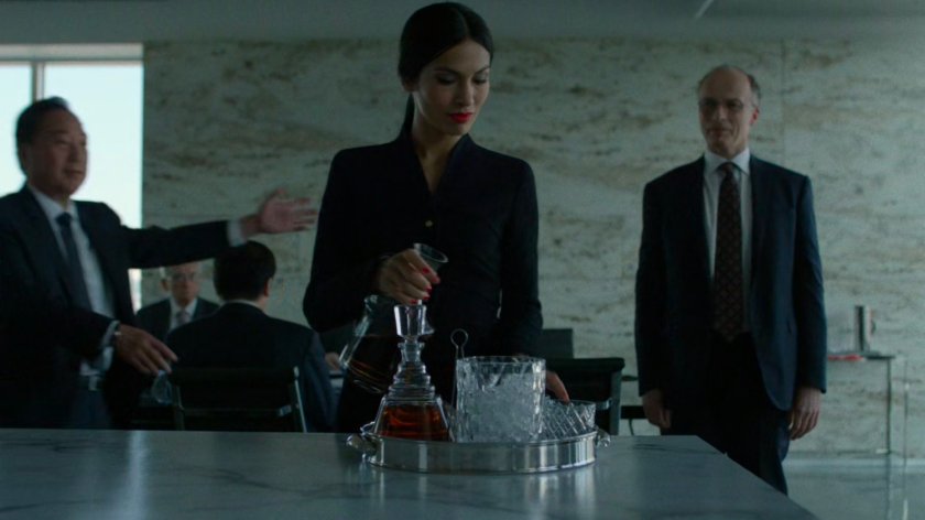 Elektra and Roxxon board members at a table in the conference room of the Yakatomi Building.