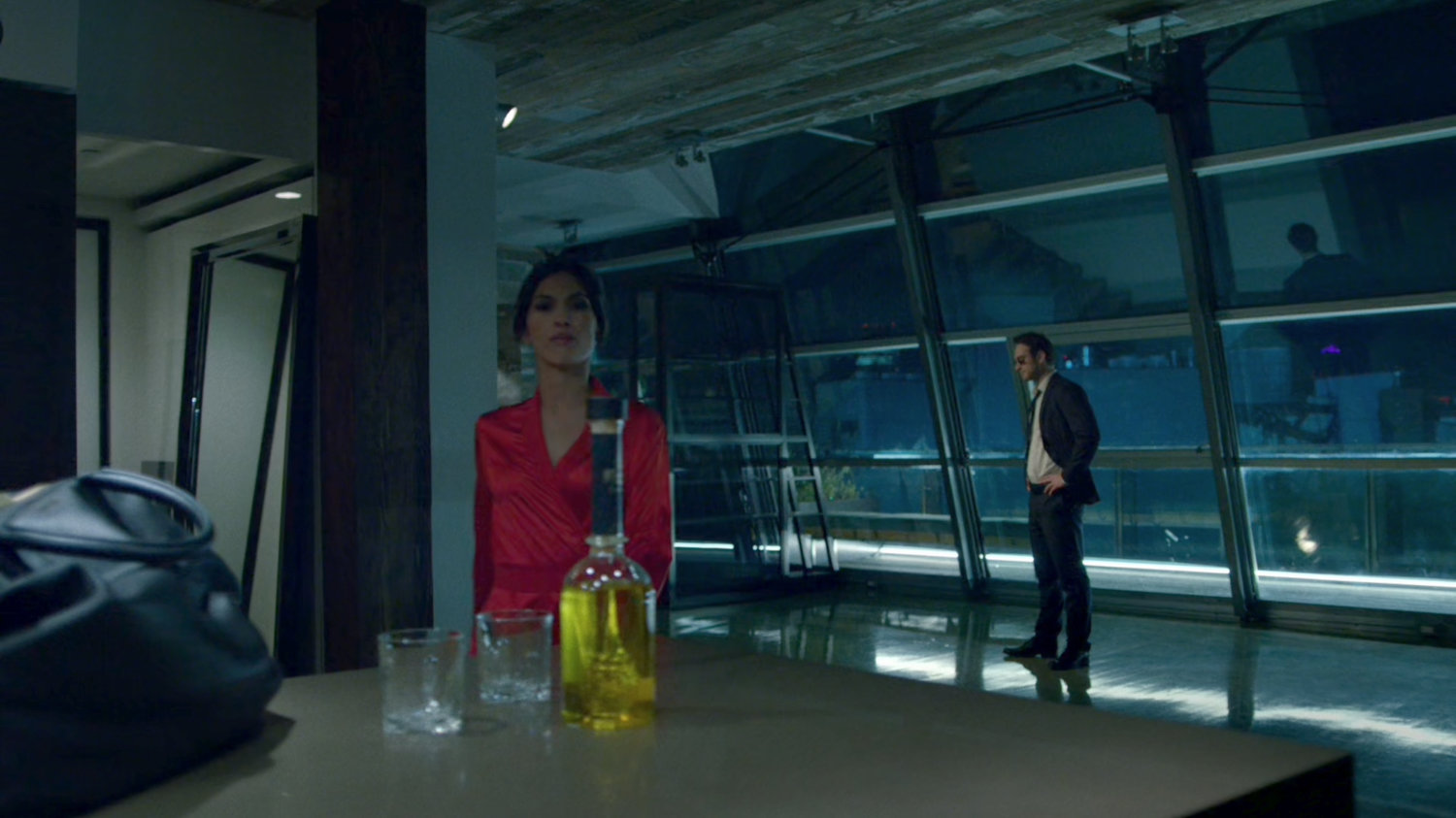 Matt and Elektra in her penthouse.