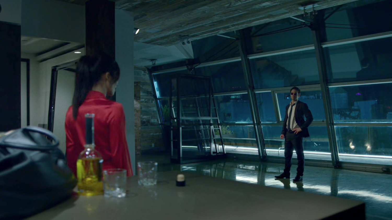 Matt and Elektra in her penthouse.