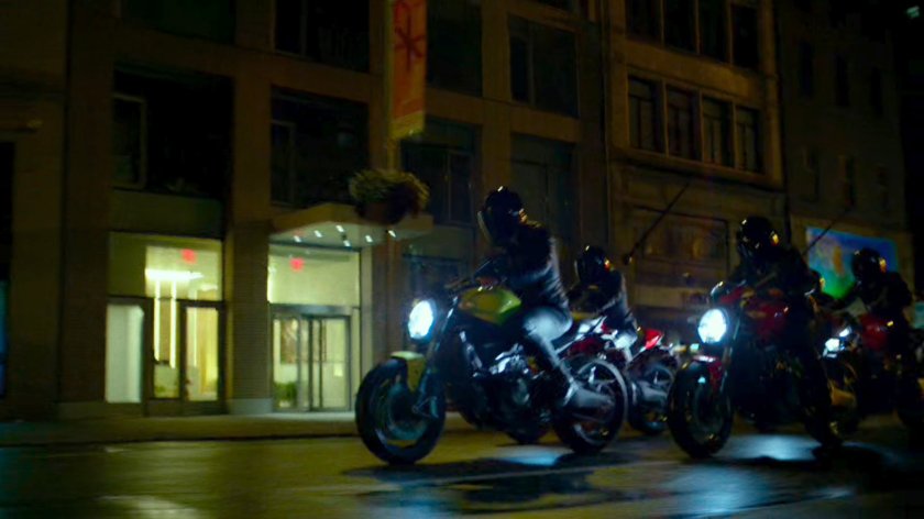 A trio of Yakuza motorcycle riders cruise through a New York street.