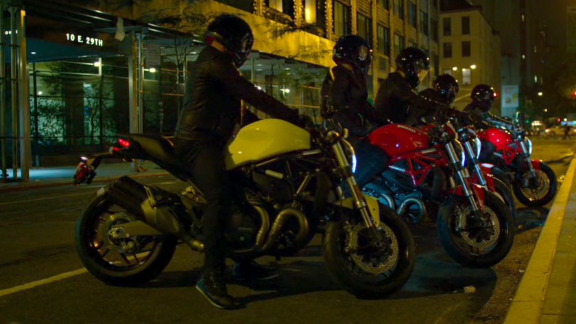 Five Yakuza motorcycle riders park outside a New York apartment building.