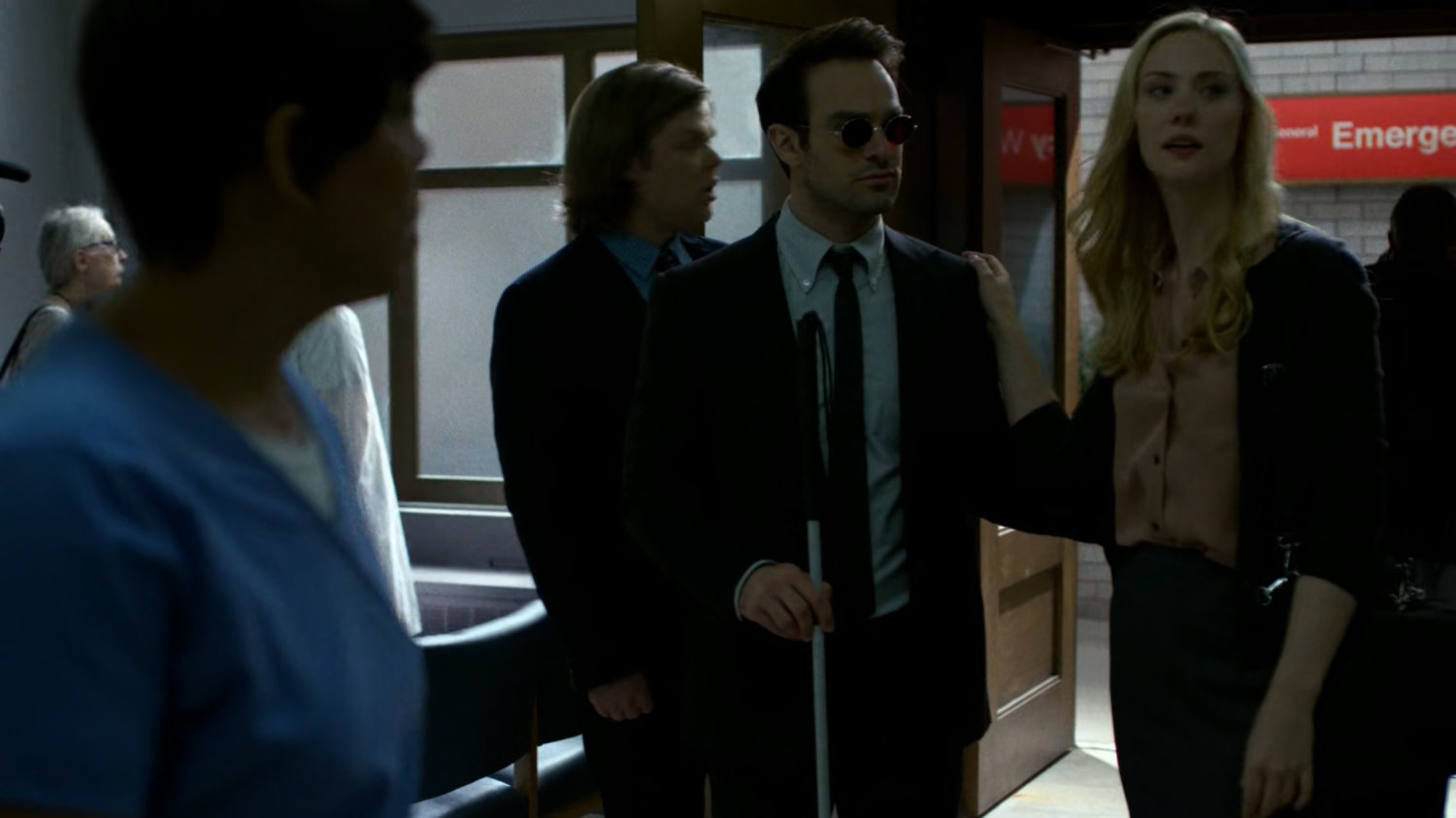 Matt, Foggy, and Karen enter Metro-General hospital at the Emergency entrance.