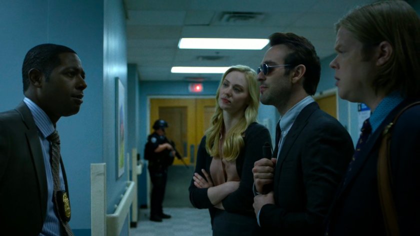 Karen, Matt, and Foggy talk to Detective Mahoney on the 5th floor of Metro-General Hospital.