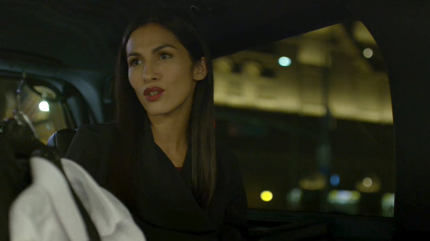 Elektra in a Limo at night.
