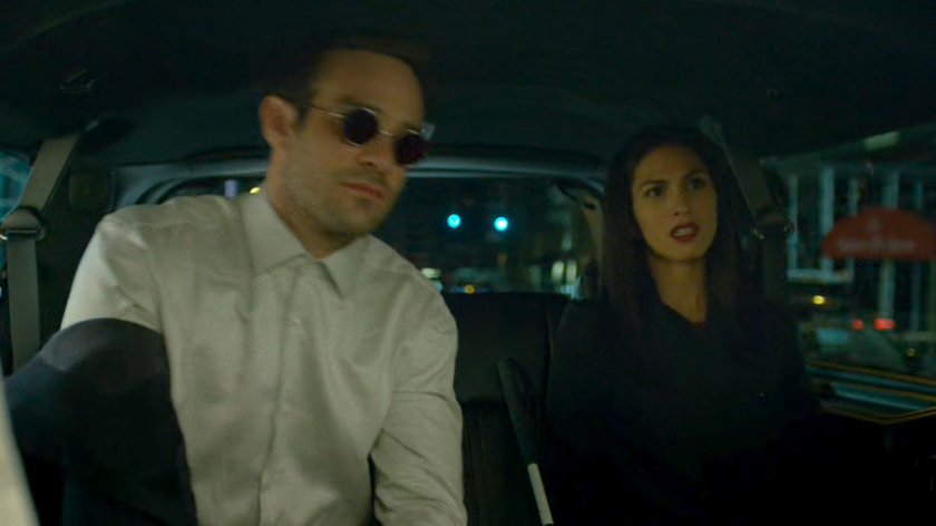 Matt and Elektra in a Limo at night.