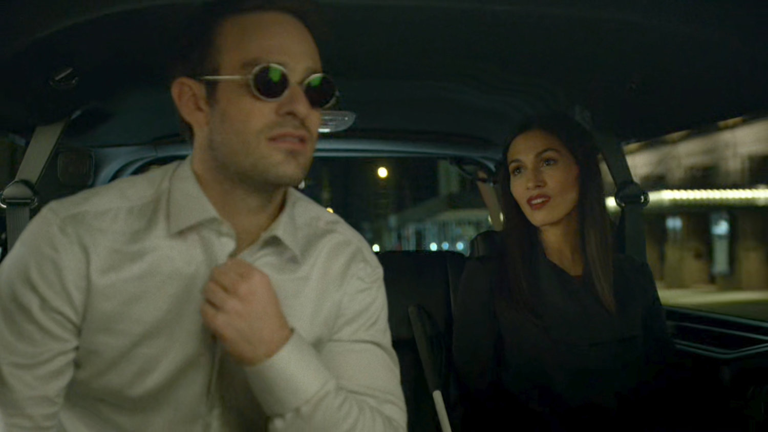 Matt and Elektra in a Limo at night.