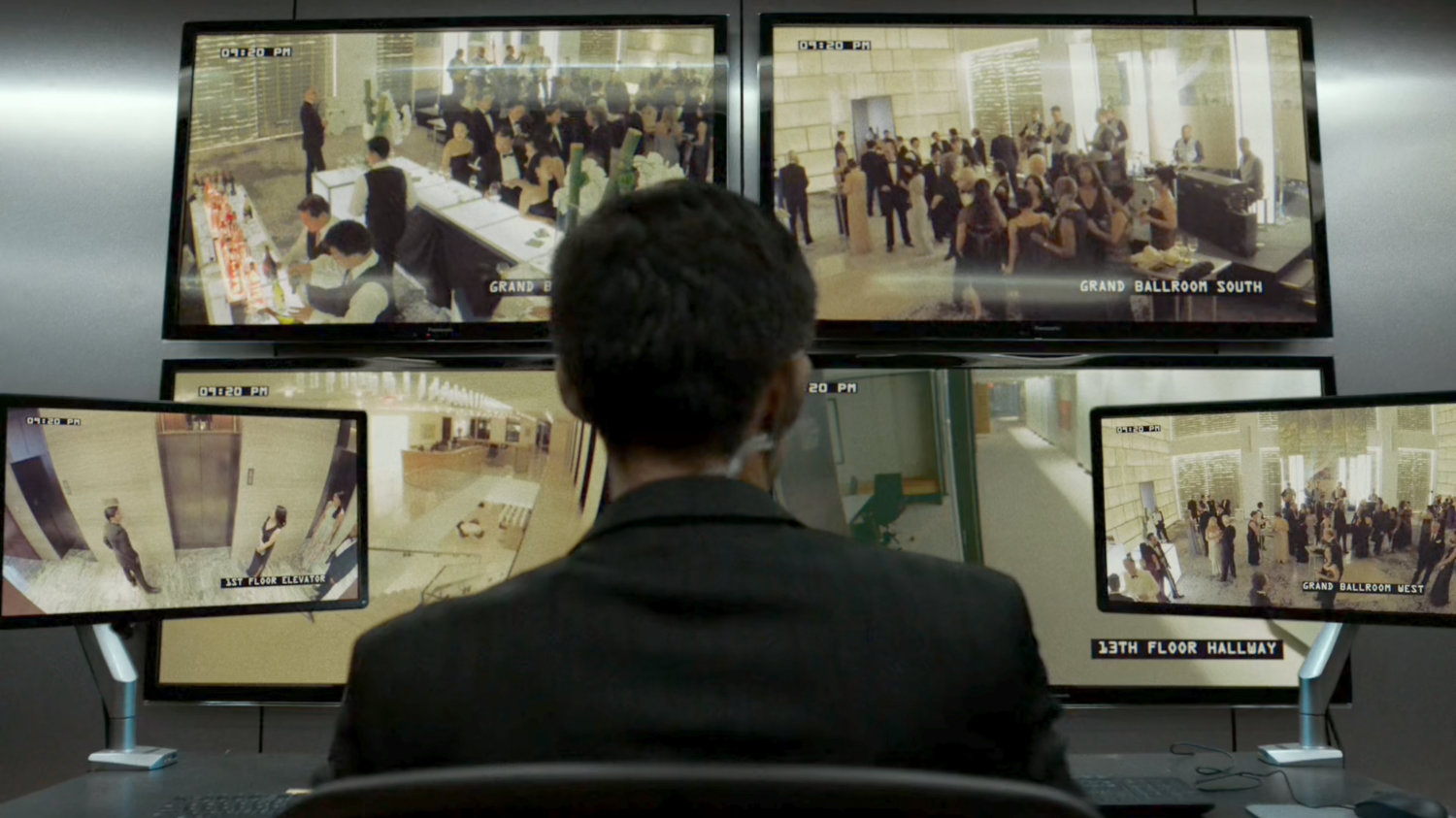 Security screens at the Roxxon Gala.