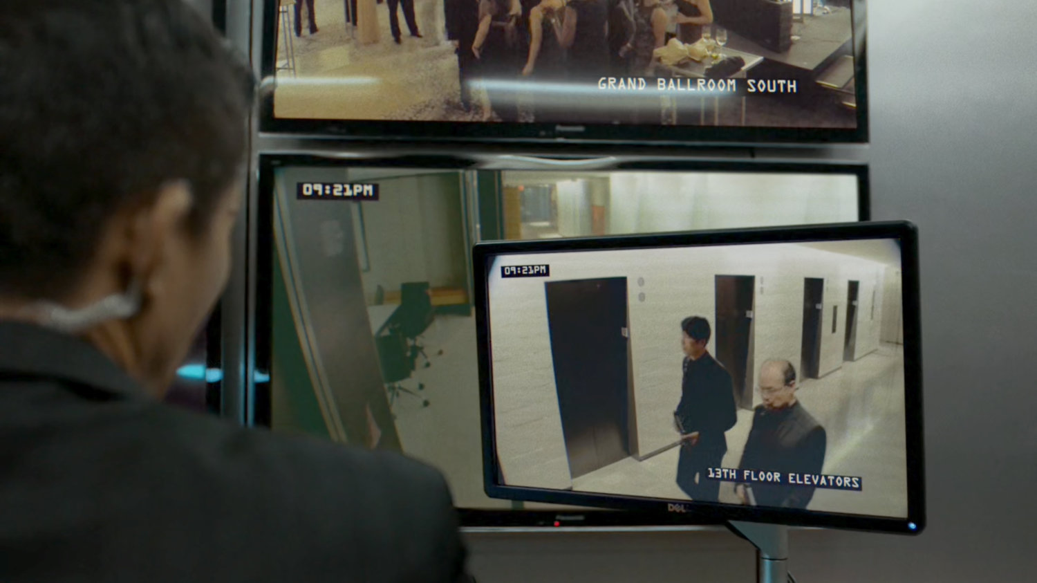 Security screens at the Roxxon Gala.