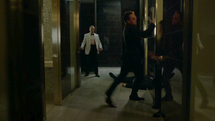 Matt knocks out Asano security guards in the Roxxon Gala bathroom.