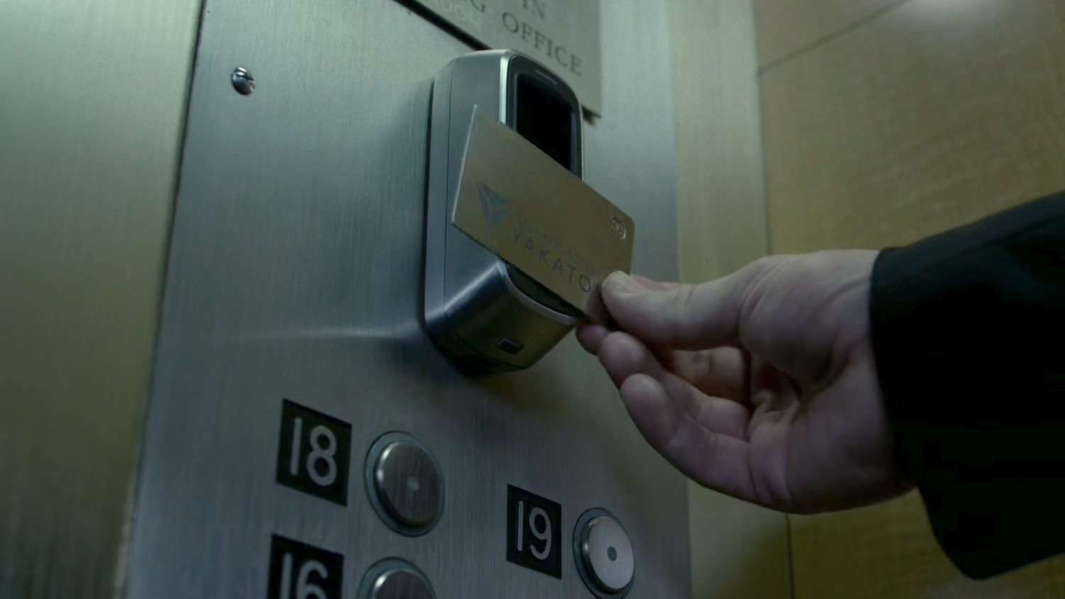 Close-up of elevator panel and a Yakatomi badge to gain access to 13th Floor.