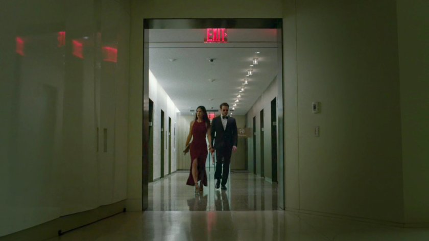 Matt and Elektra in the elevator lobby on the 13th floor of the Yakatomi Building.