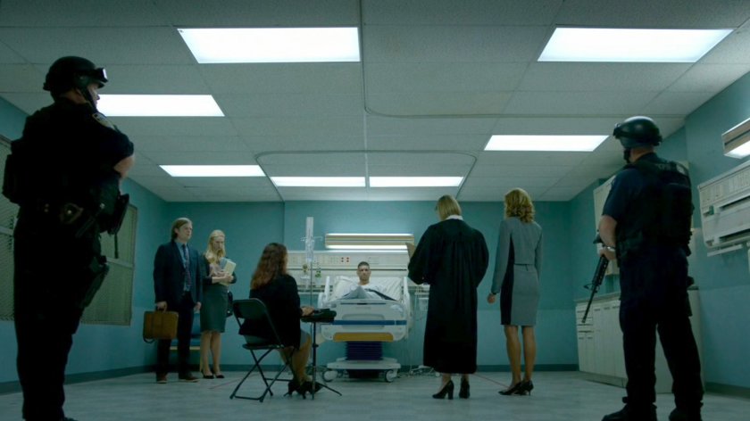 A crowd gathered inside of Frank Castle's Metro-General Hospital room.
