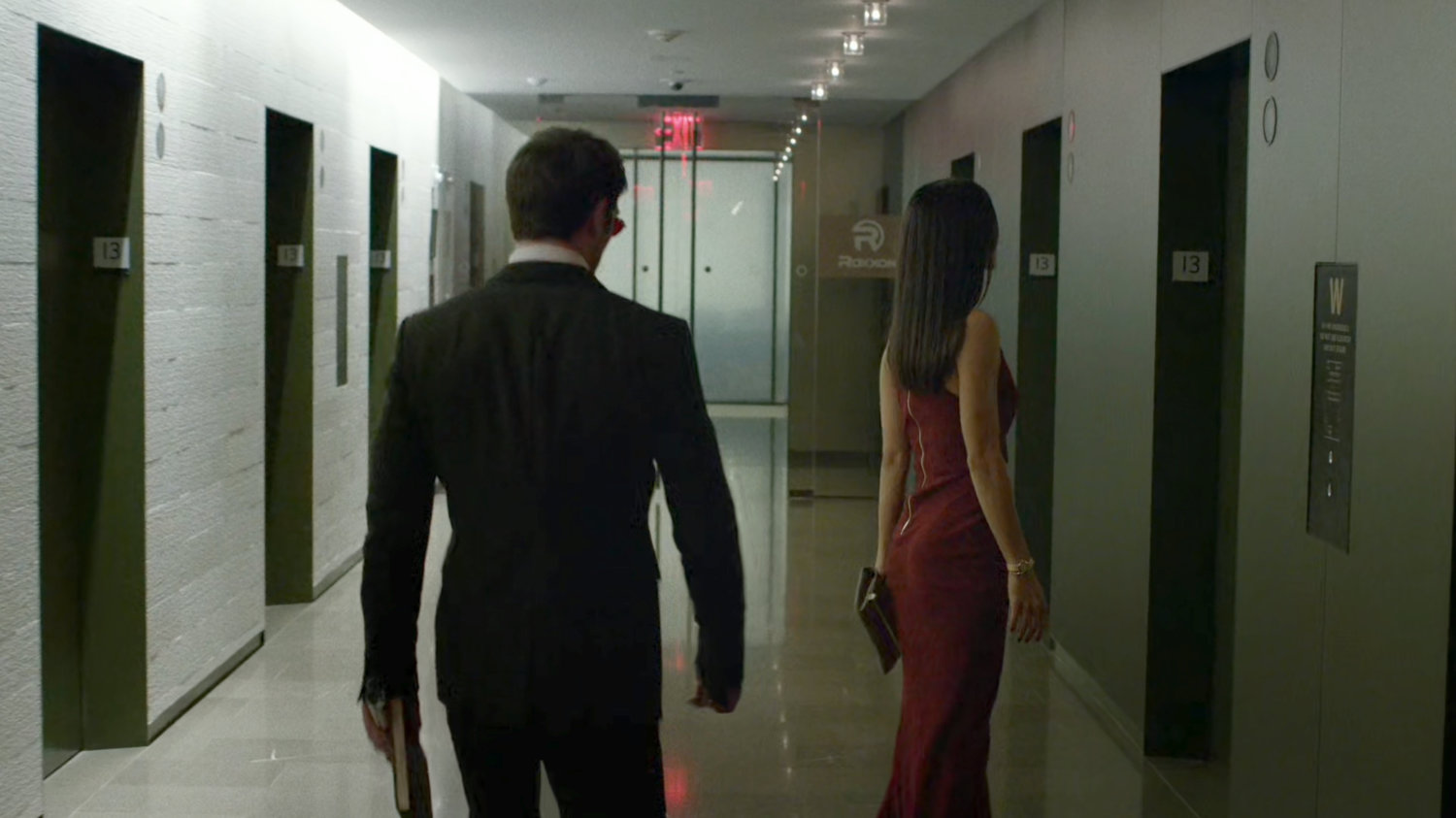 Matt and Elektra in the elevator lobby on the 13th floor of the Yakatomi Building.