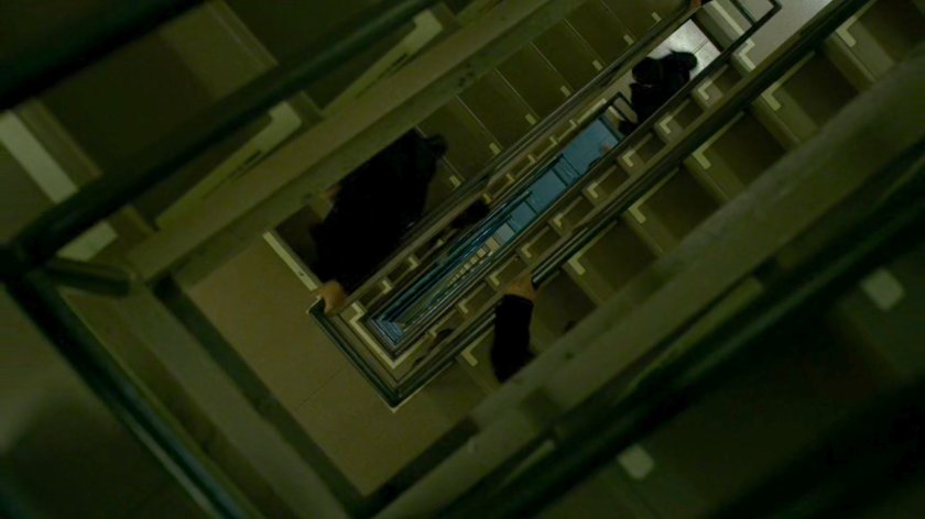 Guards ascending stairway at the Yakatomi Building.