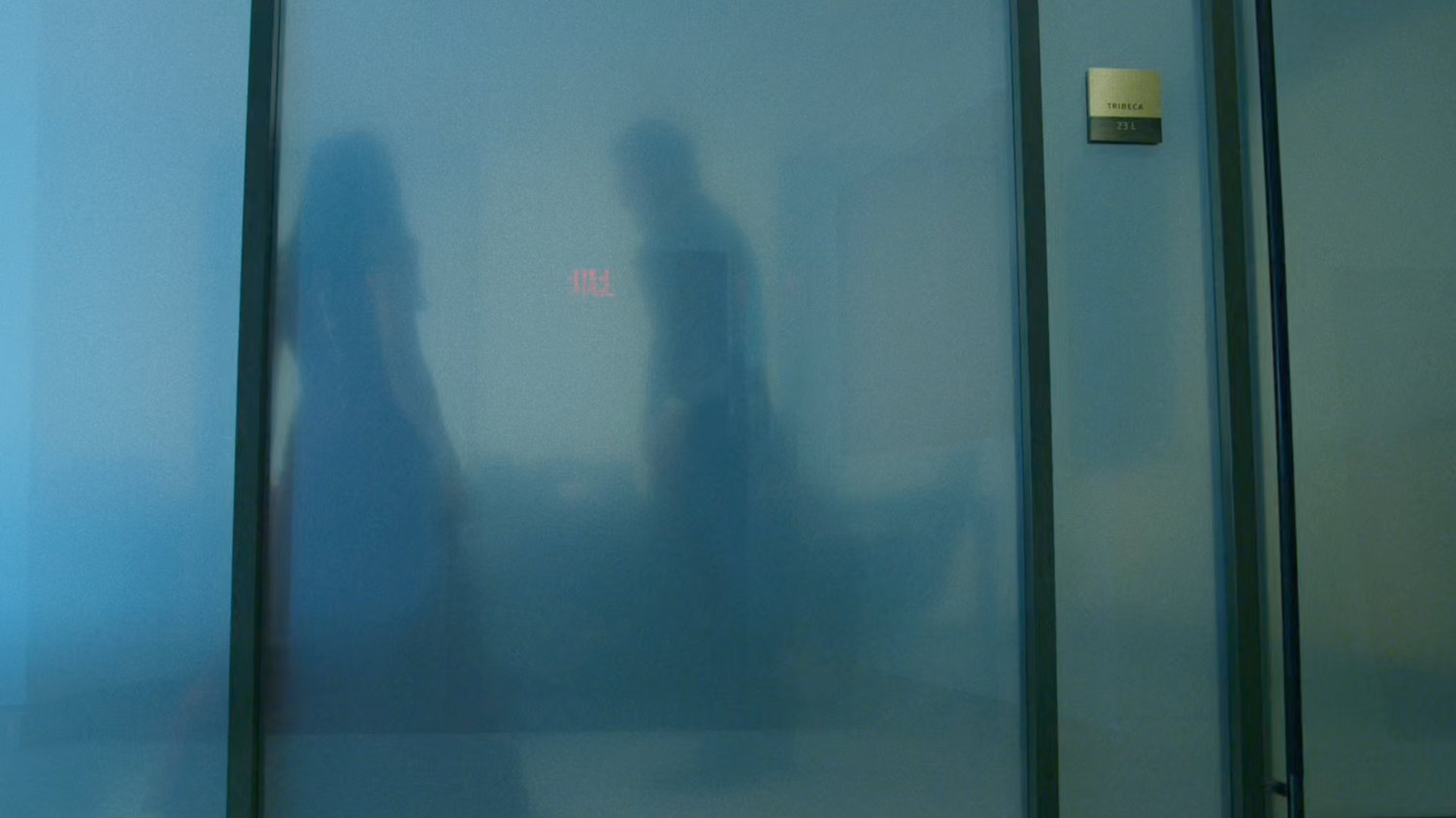 Matt and Elektra in an office on the 13th floor of the Yakatomi Building.