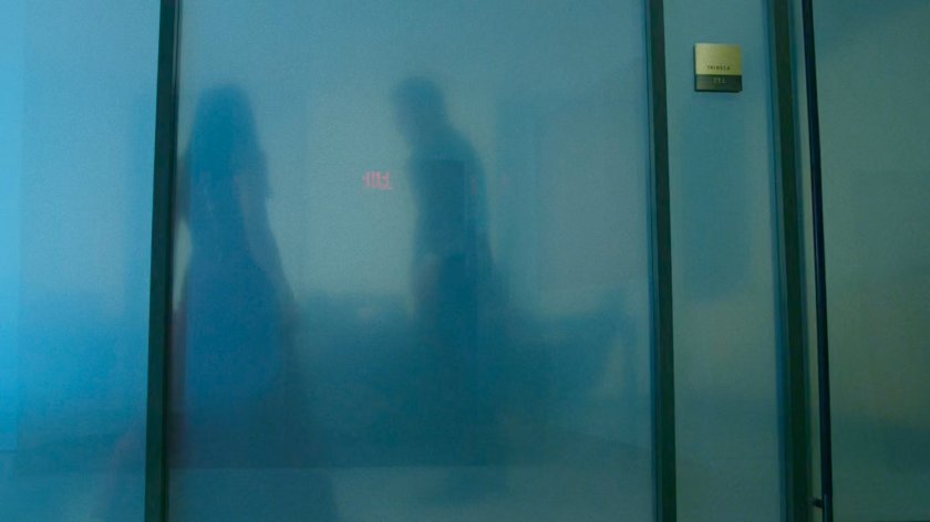 Matt and Elektra in an office on the 13th floor of the Yakatomi Building.