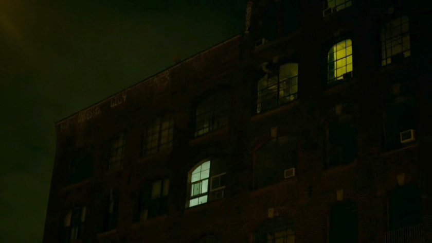 Nighttime exterior of Matt's apartment.