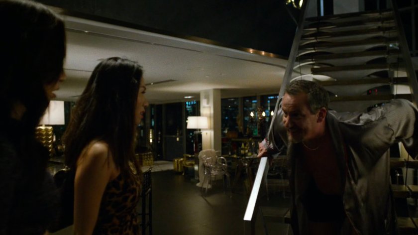 Philip Cabroni and two prostitutes in his apartment.