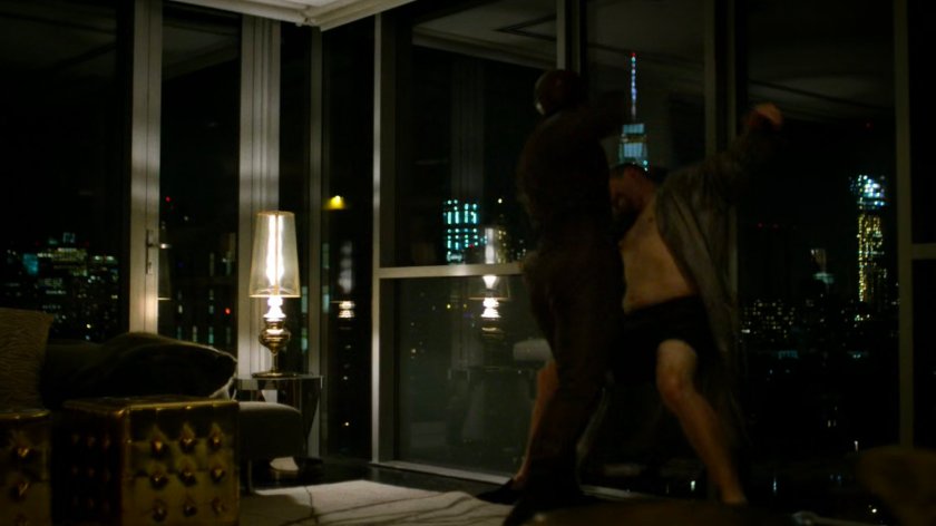 Daredevil attacks Philip Cabroni in his apartment.