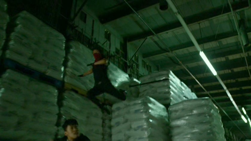 Elektra fights Yakuza member in warehouse at the Bay Ridge Rail Yard.