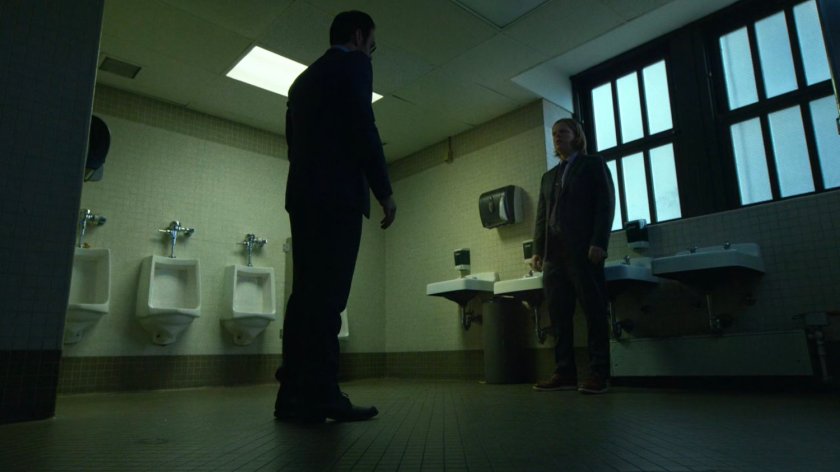 Foggy confronts Matt in the courthouse bathroom.