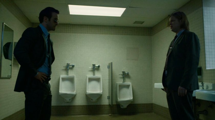 Foggy confronts Matt in the courthouse bathroom.