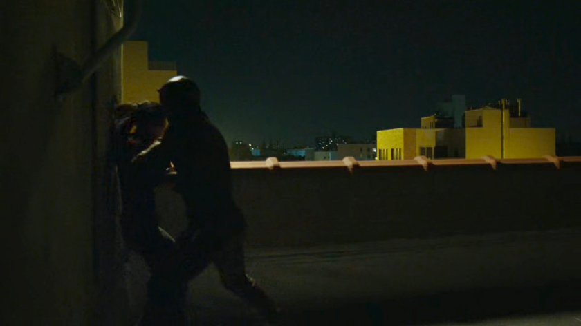 Matt tackles Elektra on rooftop by Midland Circle.