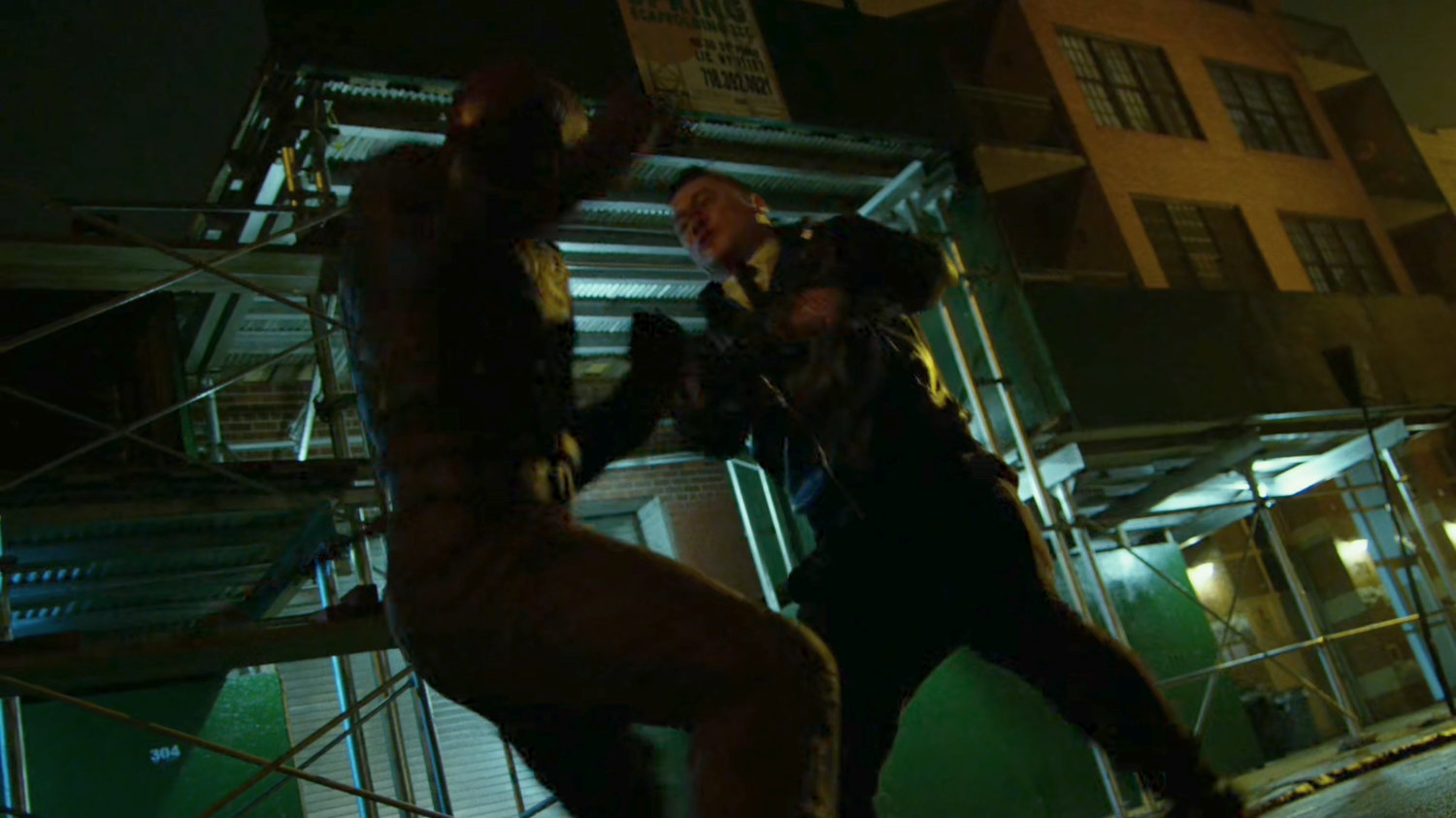 Daredevil fighting Yakuza outside Midland Circle construction site.