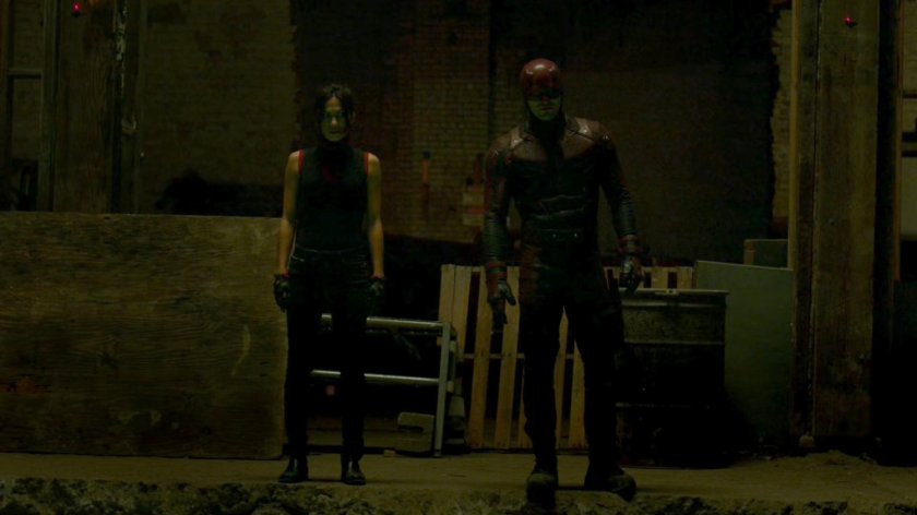 Daredevil and Elektra by large pit in Midland Circle construction site.
