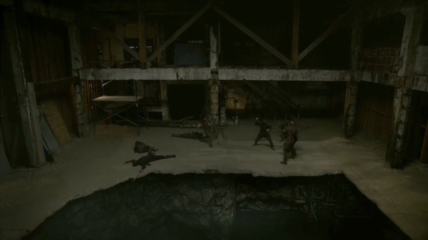 Daredevil and Elektra fight The Hand ninjas by large pit in Midland Circle construction site.