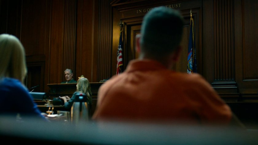 Frank Castle listens to testimony from Colonel Ray Schoonover.