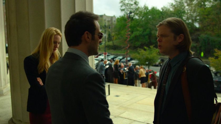 Foggy and Matt argue outside the courthouse while Karen looks on.