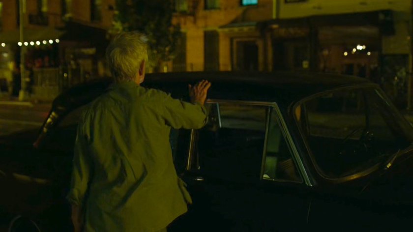 Stick gets into a car outside Matt's apartment building.