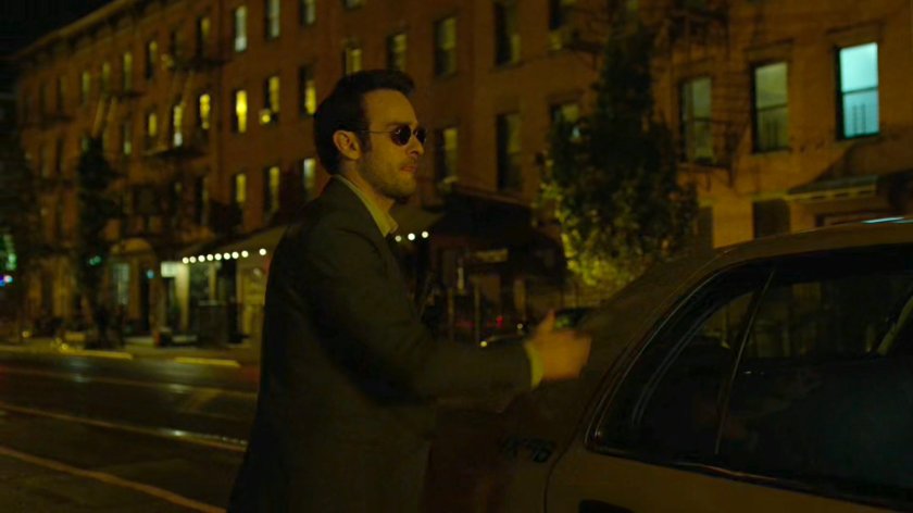 Matt exits a car outside his apartment building.