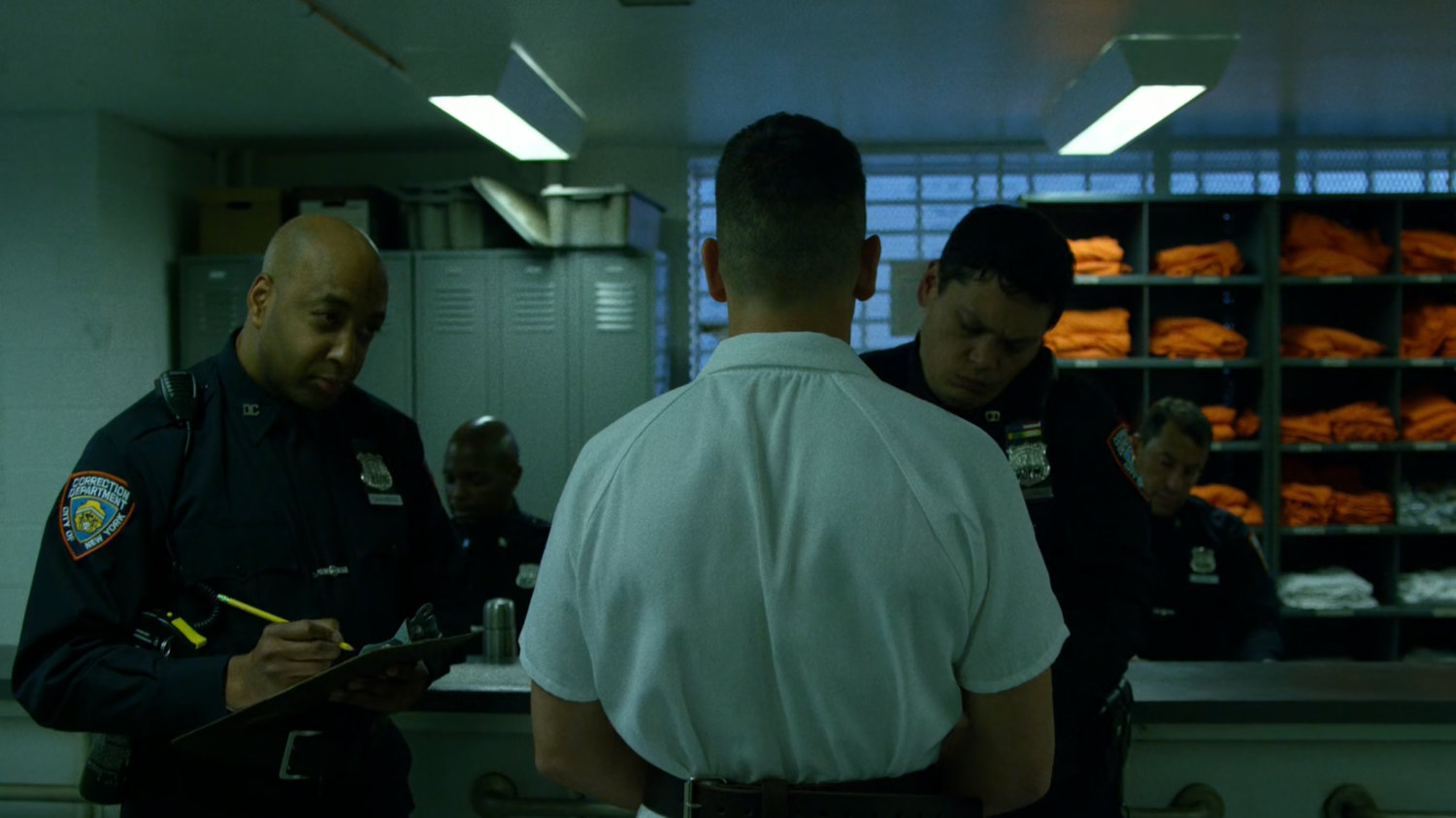 Frank Castle in getting checked into Ryker's Island correctional facility.