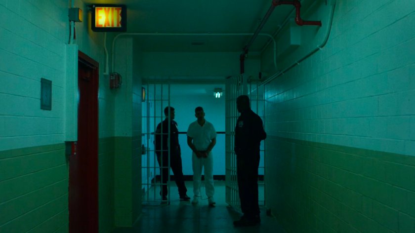 Frank escorted through gate at Ryker's Island correctional facility.