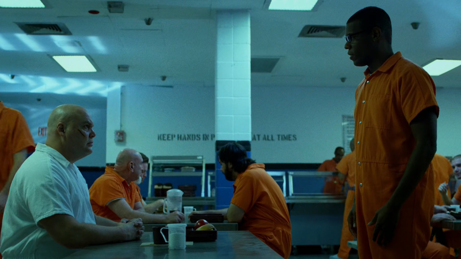 Fisk meets Stewart in the cafeteria at Ryker's Island correctional facility.