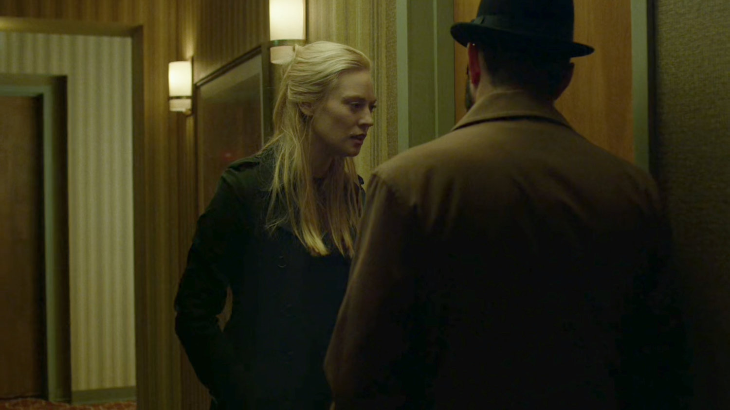 Karen and Ellison in hallway outside Tepper's motel room.