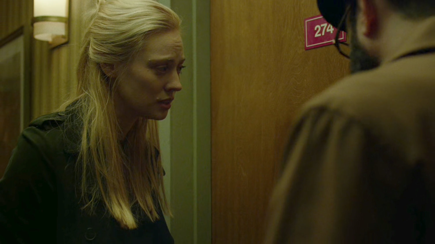 Karen and Ellison in hallway outside Tepper's motel room.