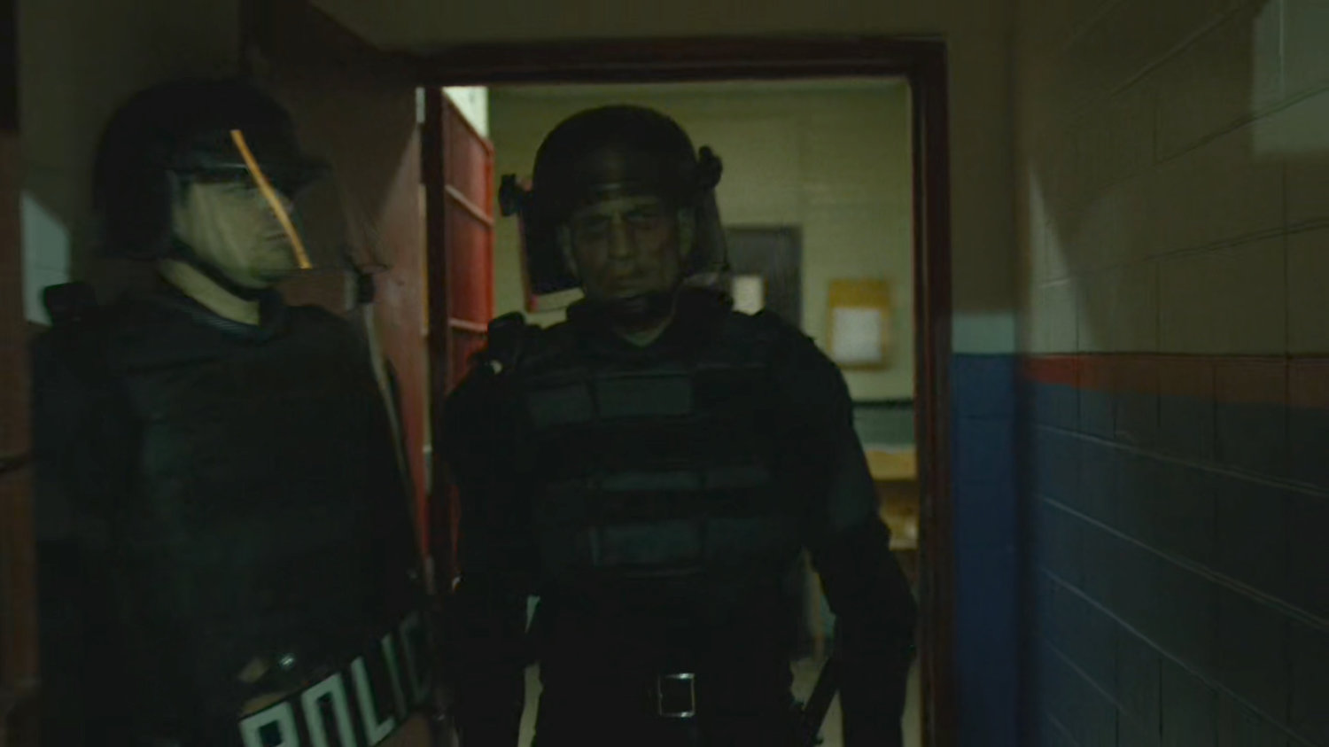 Frank disguised as a riot guard walking out of Ryker's Island correctional facility.
