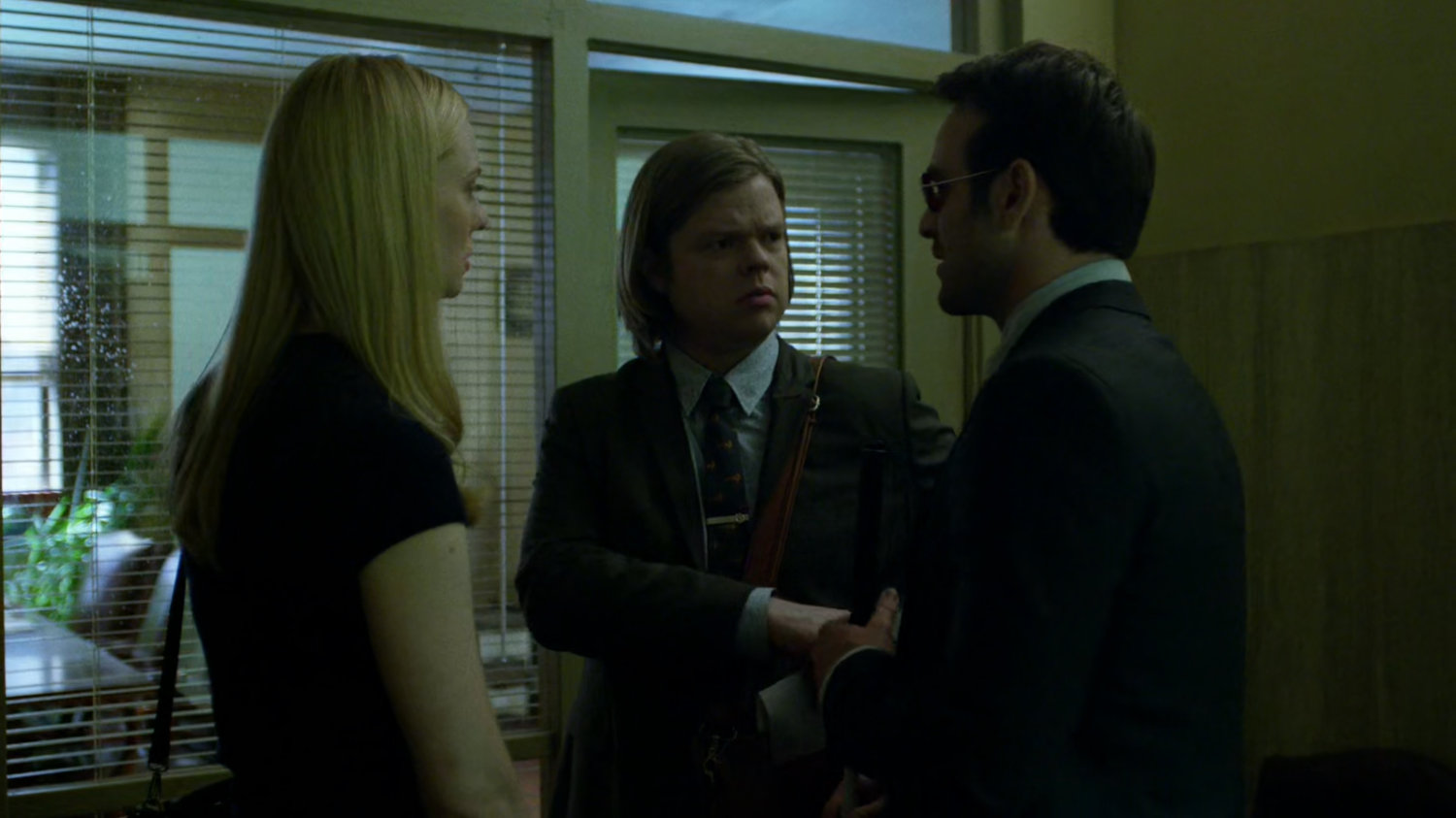 Matt, Karen, and Foggy outside the District Attorney's office.