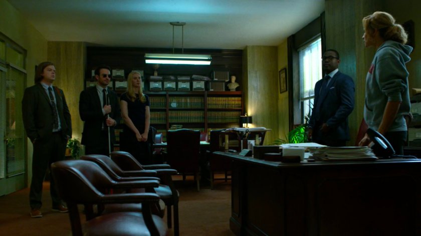 Matt, Karen, and Foggy inside the District Attorney's office with ADA Tower and DA Reyes.