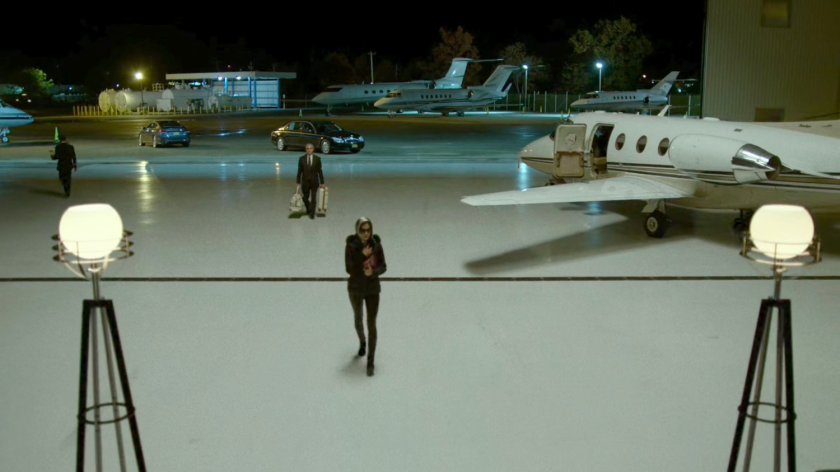 Elektra entering a private airplane hangar.