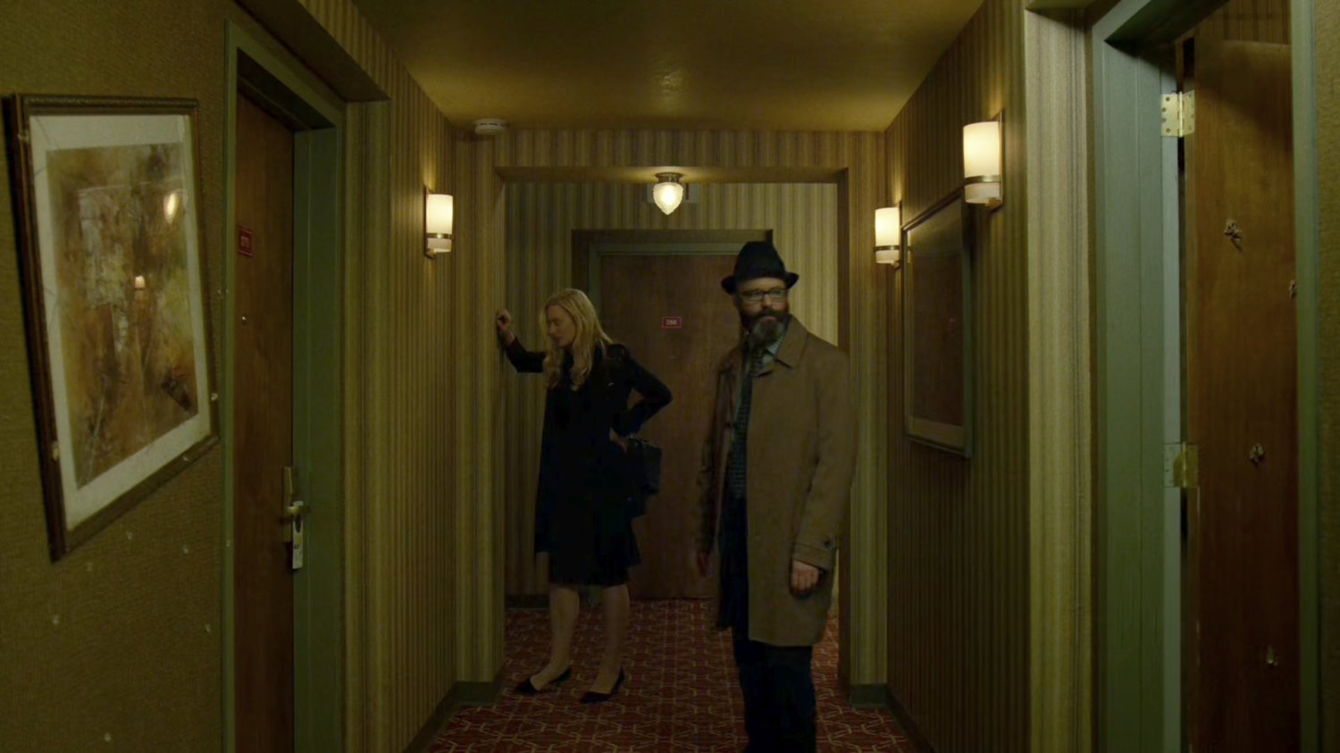 Karen and Ellison in the hallway outside Tepper's motel room.