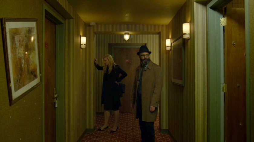 Karen and Ellison in the hallway outside Tepper's motel room.