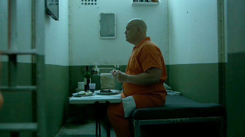 Wilson Fisk dining in his prison cell at Ryker's Island correctional facility.